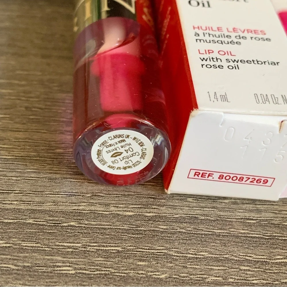 Clarins Lip Comfort Hydrating Oil 04 Pitaya Sheer Baby Pink oh Reactive Travel